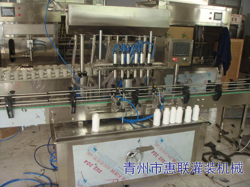 全自動(dòng)液體肥料灌裝機(jī) 全自動(dòng)液體肥料灌裝機(jī)