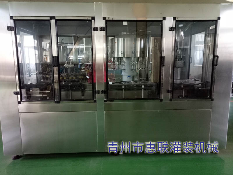 白酒小型三合一灌裝機(jī) 白酒小型三合一灌裝機(jī)